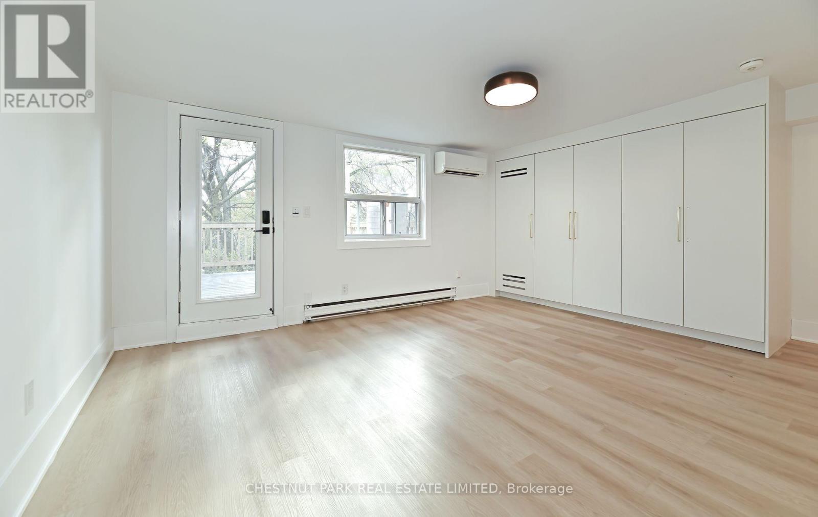 3 - 1105 Queen Street E, Toronto, Ontario  M4M 1K7 - Photo 2 - E12561390