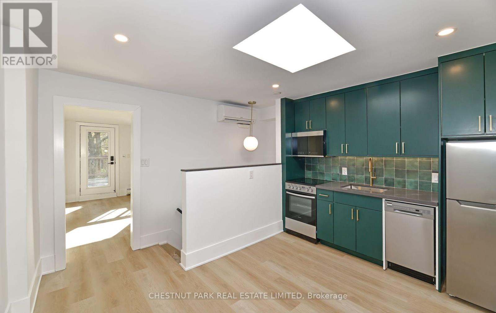 3 - 1105 Queen Street E, Toronto, Ontario  M4M 1K7 - Photo 4 - E12561390