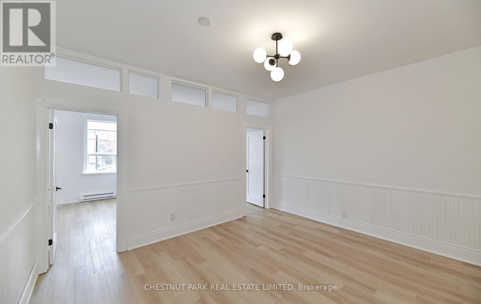 2 - 1105 Queen Street E, Toronto, Ontario  M4M 1K7 - Photo 3 - E12561392