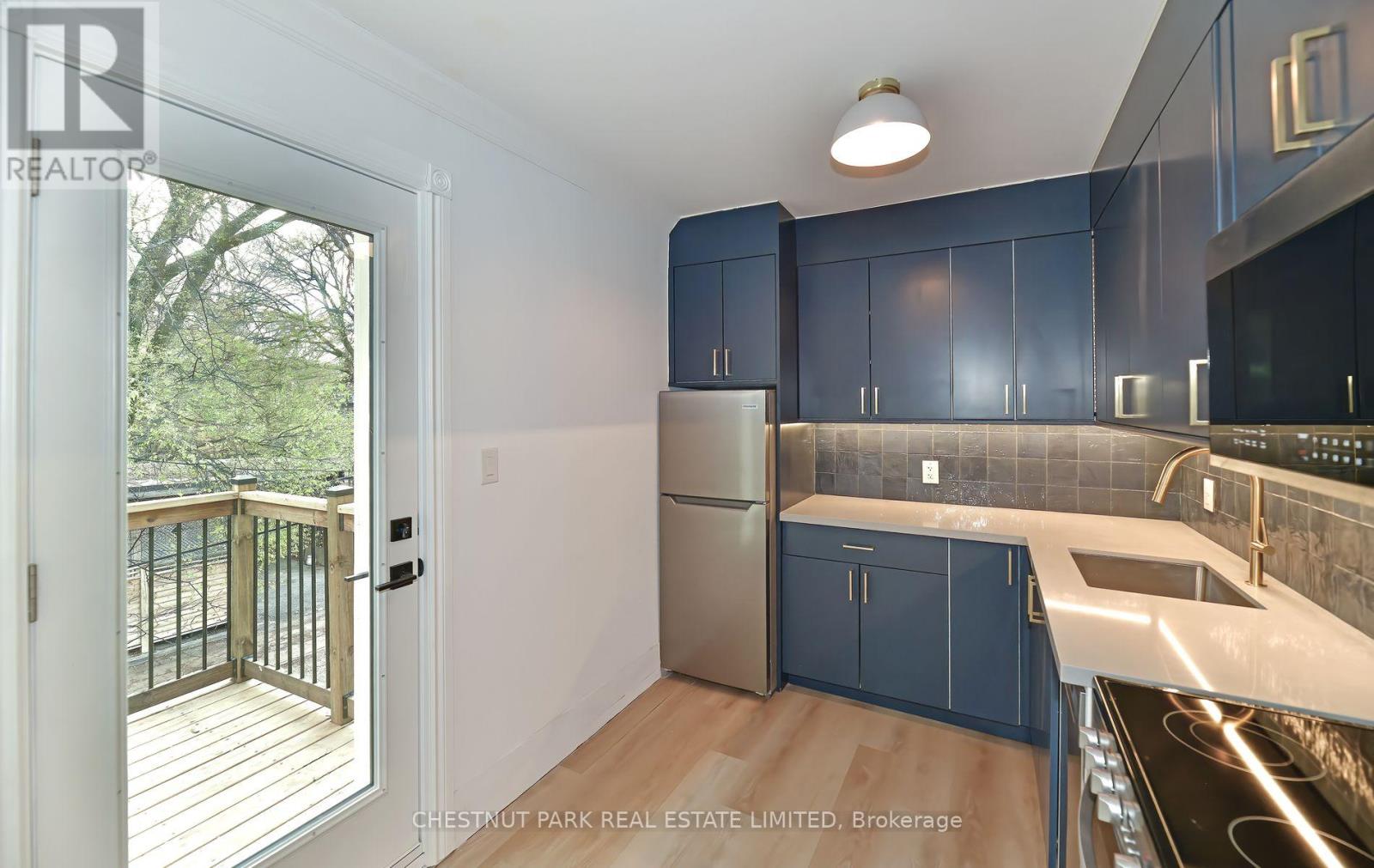 2 - 1105 Queen Street E, Toronto, Ontario  M4M 1K7 - Photo 4 - E12561392