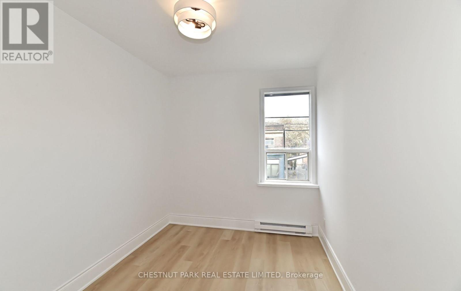 2 - 1105 Queen Street E, Toronto, Ontario  M4M 1K7 - Photo 7 - E12561392
