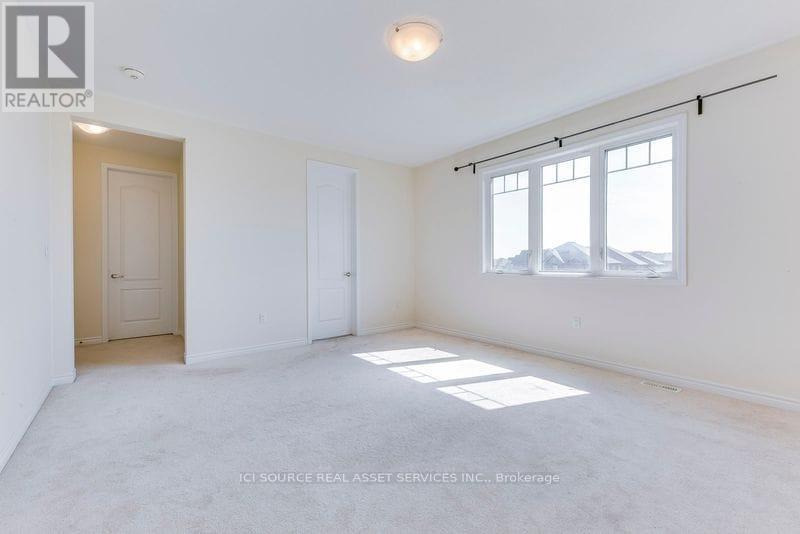 52 Portman Street, Caledon, Ontario  L7C 4E4 - Photo 12 - W12561434