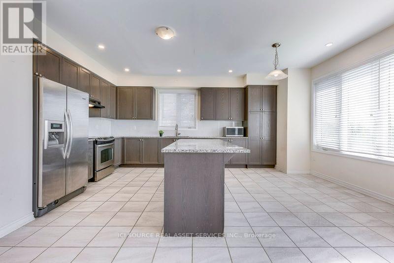 52 Portman Street, Caledon, Ontario  L7C 4E4 - Photo 6 - W12561434