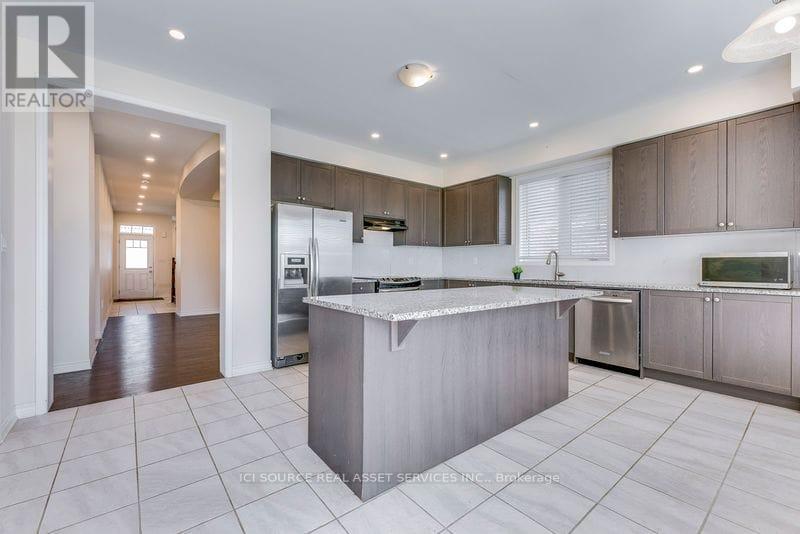 52 Portman Street, Caledon, Ontario  L7C 4E4 - Photo 8 - W12561434