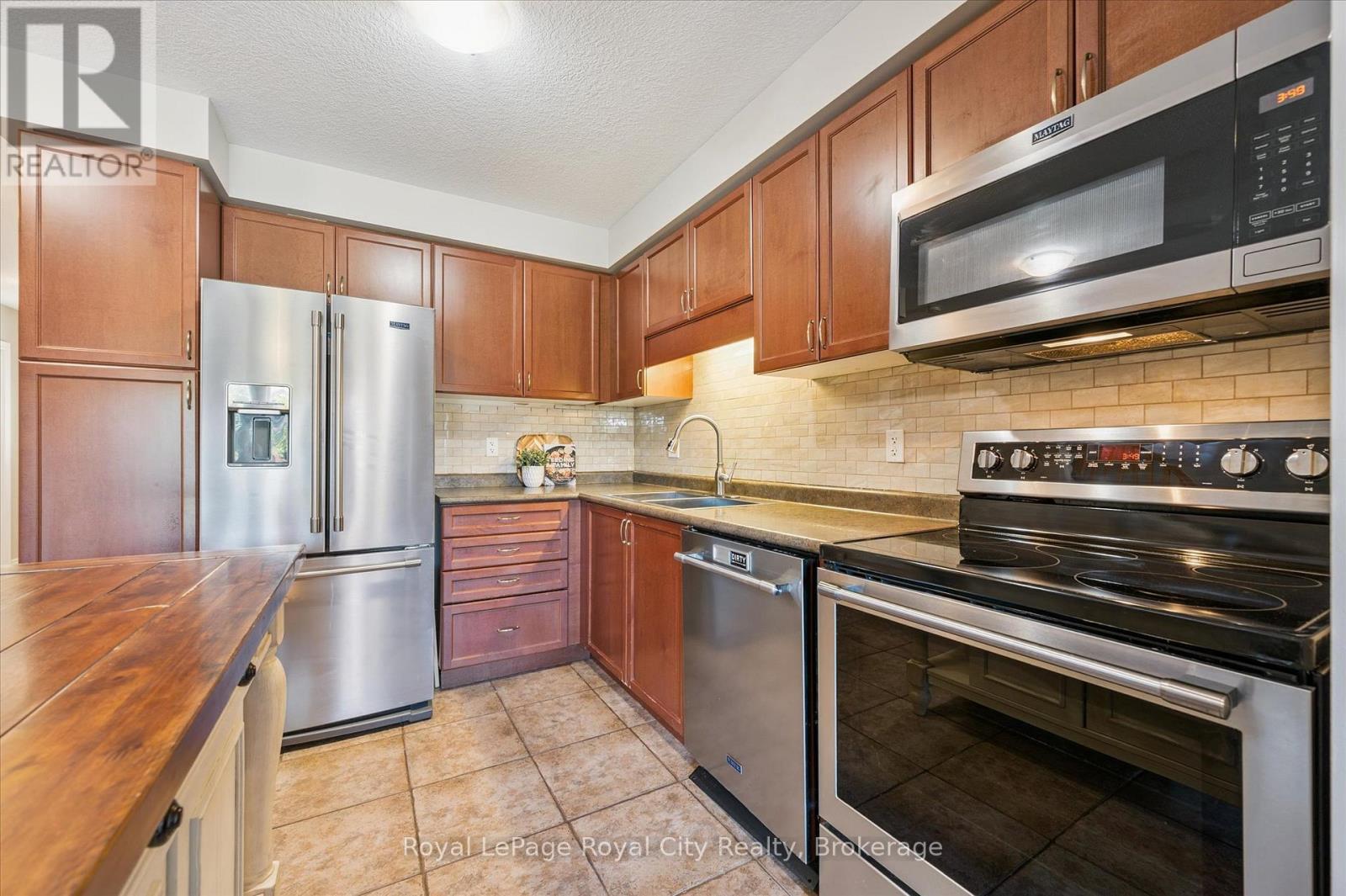 33 - 10 Katemore Drive, Guelph, Ontario N1L 0J2 - Photo 9 - X12561910