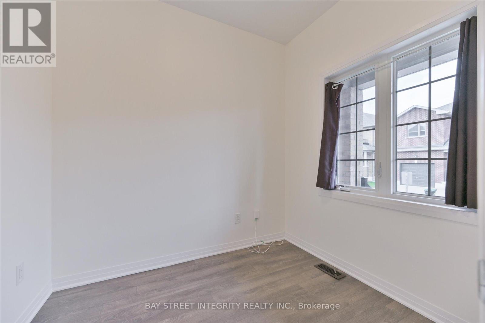 17 Bedford Estates Crescent, Barrie, Ontario  L4N 9K5 - Photo 6 - S12561922