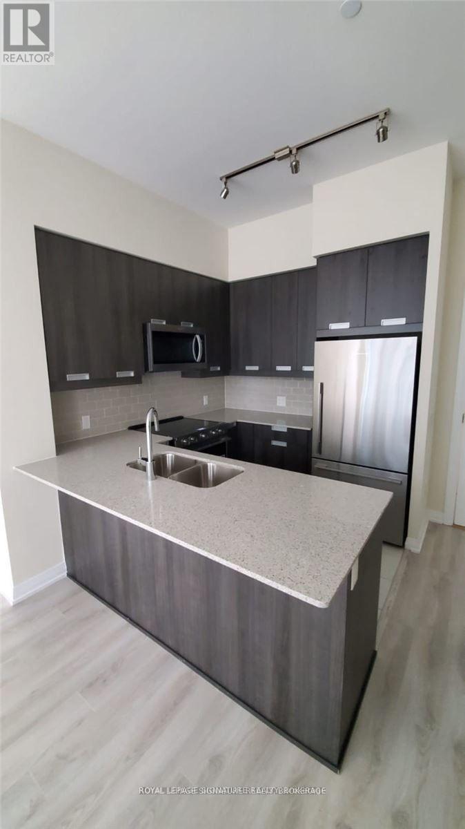 107 - 65 Watergarden Drive, Mississauga, Ontario  L5R 0G8 - Photo 6 - W12562226