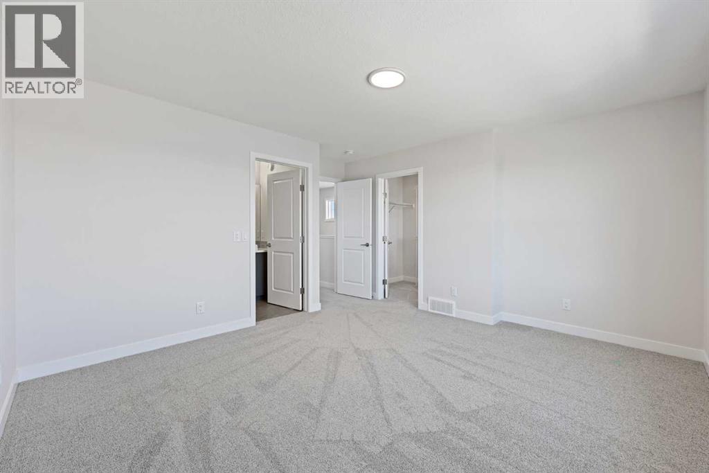 329 Ambleton Drive Nw, Calgary, Alberta  T3P 2B6 - Photo 9 - A2202661