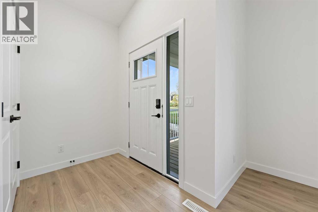 116 Mitchell Walk Nw, Calgary, Alberta  T3R 2G2 - Photo 4 - A2252719