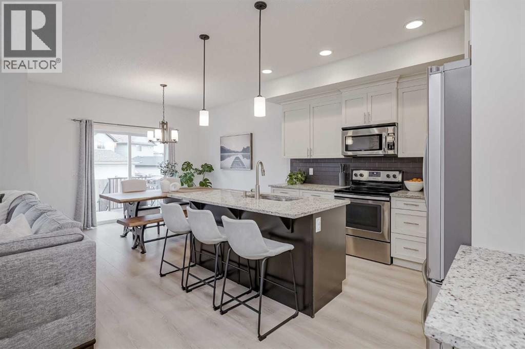 68 Copperpond Mews Se, Calgary, Alberta  T2Z 0Z3 - Photo 5 - A2268477