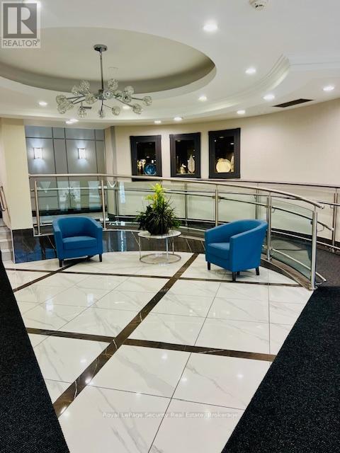 423 - 1001 Cedarglen Gate, Mississauga, Ontario  L5C 4R2 - Photo 2 - W12560878