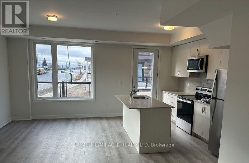 02 - 3415 Ridgeway Drive, Mississauga, Ontario  L5L 0B9 - Photo 4 - W12562684