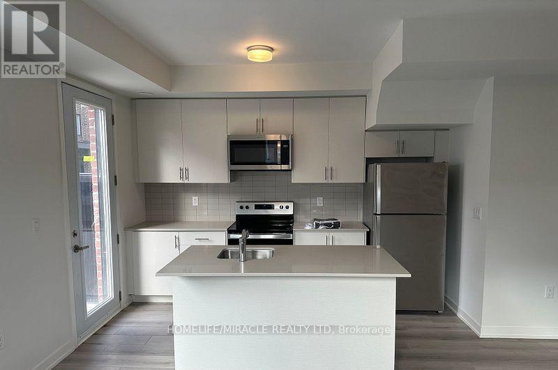 02 - 3415 Ridgeway Drive, Mississauga, Ontario  L5L 0B9 - Photo 5 - W12562684