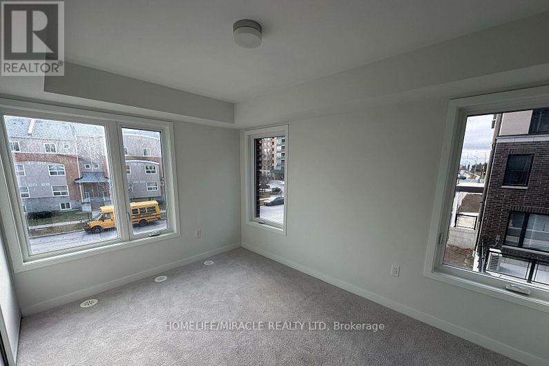 02 - 3415 Ridgeway Drive, Mississauga, Ontario  L5L 0B9 - Photo 6 - W12562684