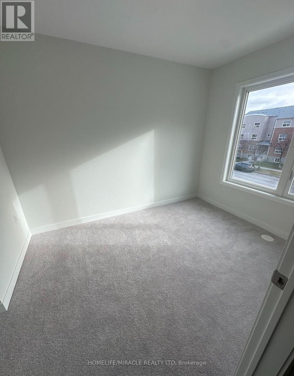 02 - 3415 Ridgeway Drive, Mississauga, Ontario  L5L 0B9 - Photo 7 - W12562684