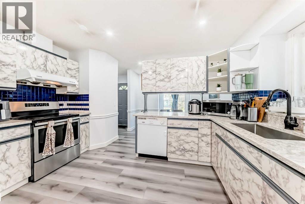 1235 Sandpiper Road Nw, Calgary, Alberta  T3K 3E1 - Photo 7 - A2270158