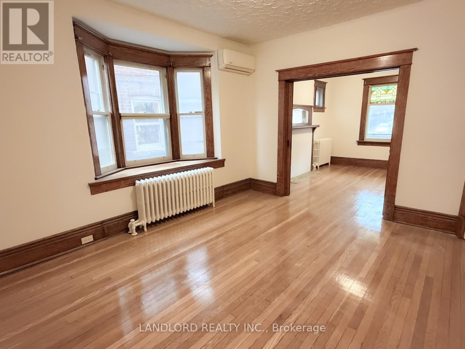 1 - 2469 Queen Street E, Toronto, Ontario  M4E 1H8 - Photo 2 - E12562910