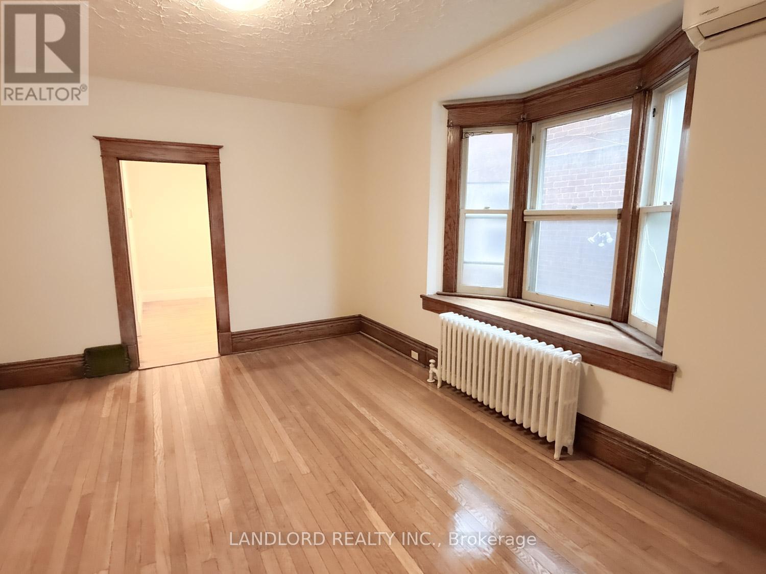 1 - 2469 Queen Street E, Toronto, Ontario  M4E 1H8 - Photo 3 - E12562910