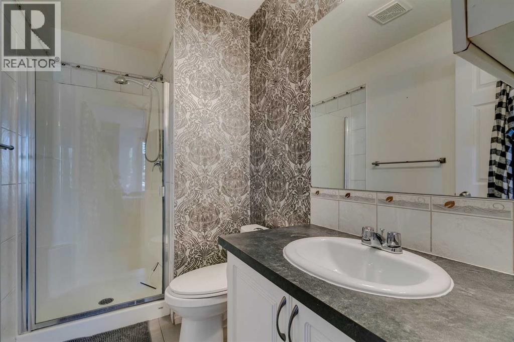 51 Spring Meadows Bay, Okotoks, Alberta  T1S 2G8 - Photo 17 - A2259710