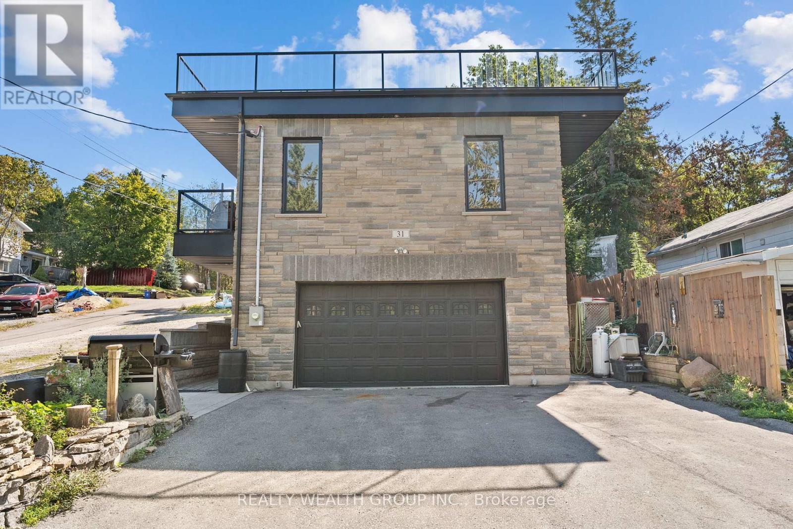 31 Silver Birch Street, Kawartha Lakes, Ontario  K0M 1L0 - Photo 2 - X12369804