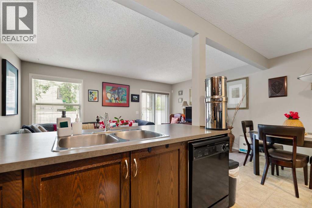 90 Panatella Villas Nw, Calgary, Alberta  T3K 0G6 - Photo 10 - A2235847