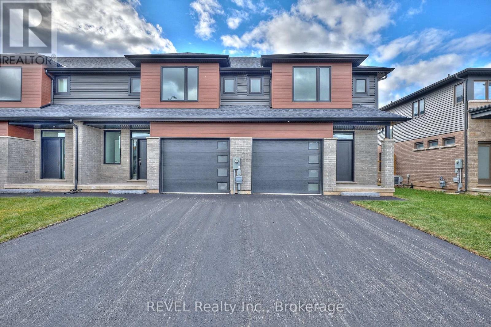 7437 Matteo Drive, Niagara Falls, Ontario L2H 3T3 - Photo 3 - X12443954