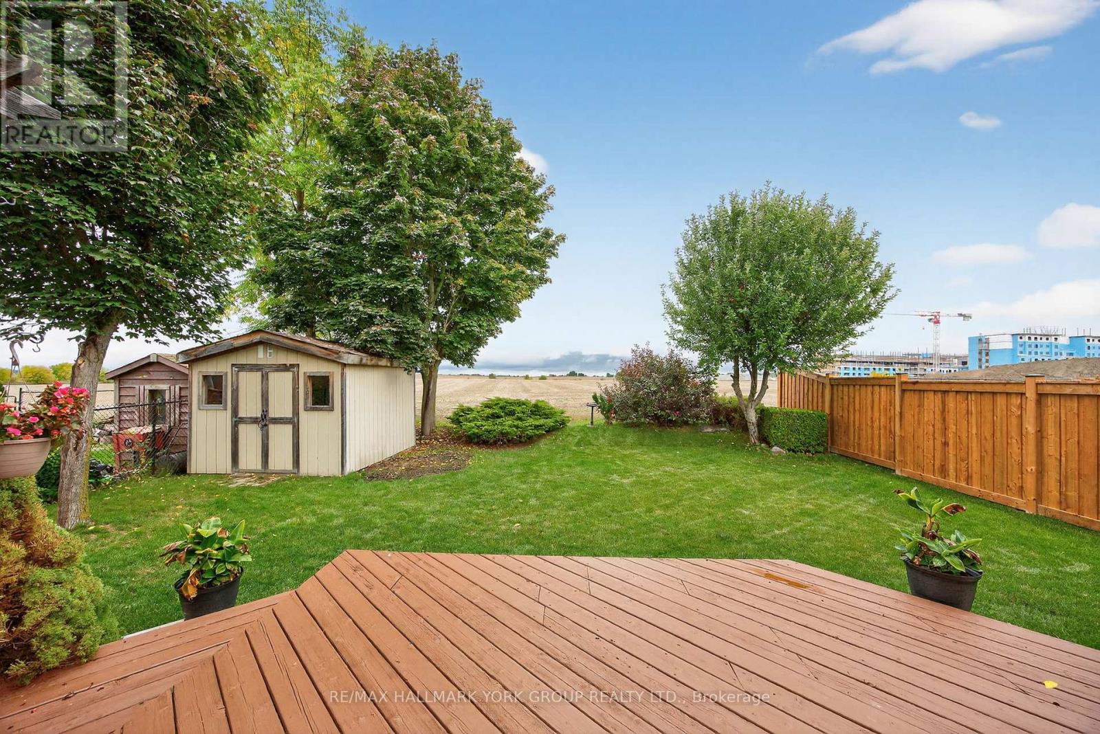 9 Reynolds Avenue, New Tecumseth, Ontario  L0G 1A0 - Photo 3 - N12429928