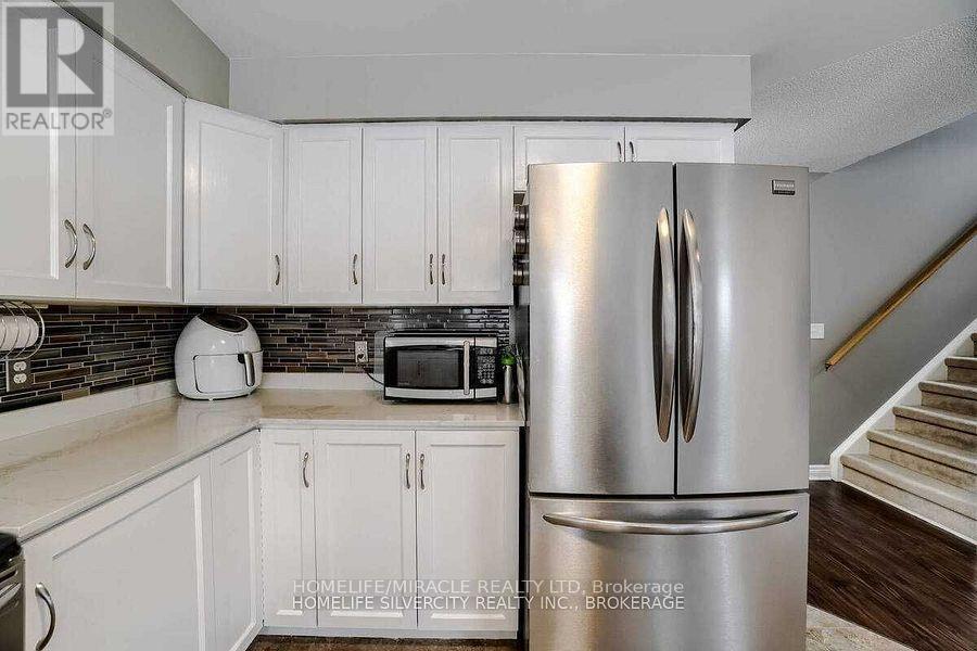 Uppers Exclude Basement - 19 Patterson Drive, North Dumfries, Ontario  N0B 1E0 - Photo 3 - X12563604