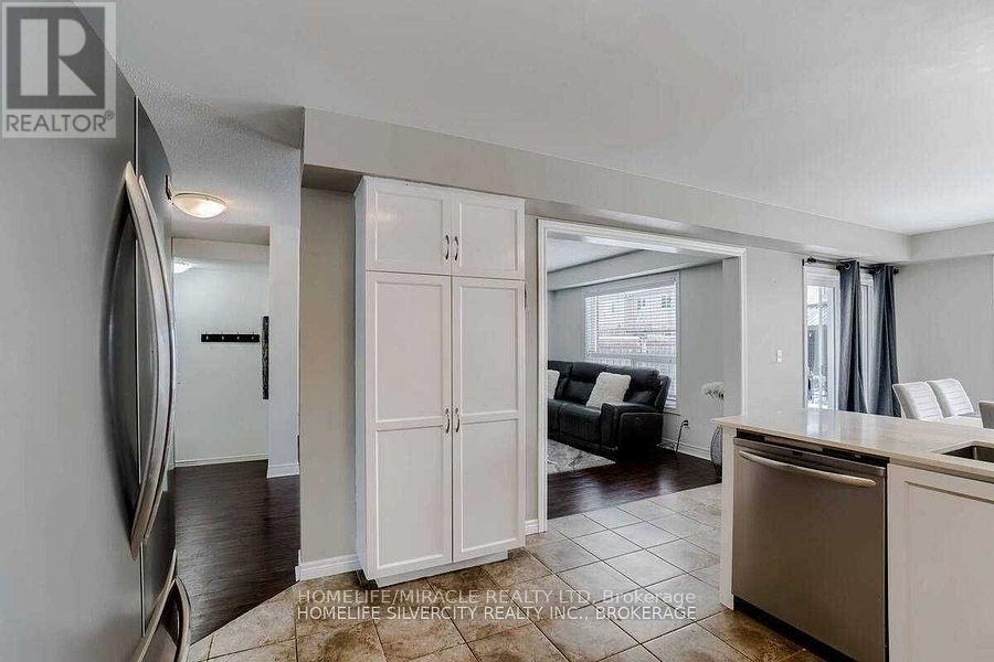 Uppers Exclude Basement - 19 Patterson Drive, North Dumfries, Ontario  N0B 1E0 - Photo 4 - X12563604