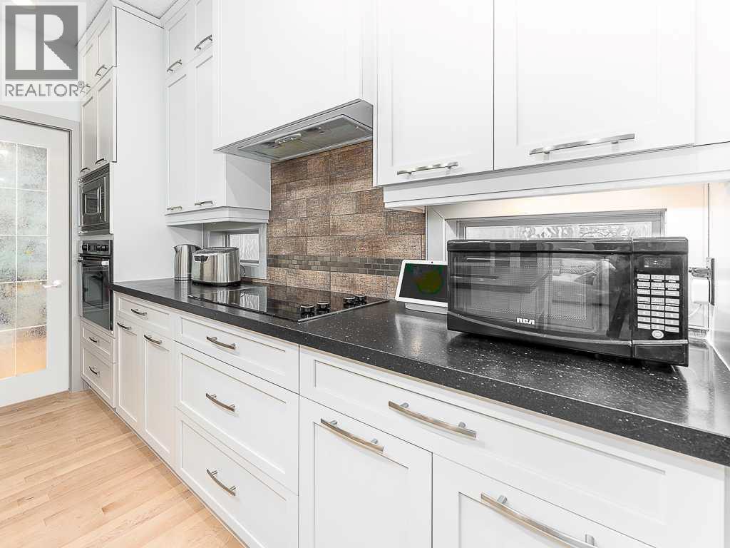 91 Discovery Ridge Boulevard Sw, Calgary, Alberta  T3H 4Y2 - Photo 14 - A2267358