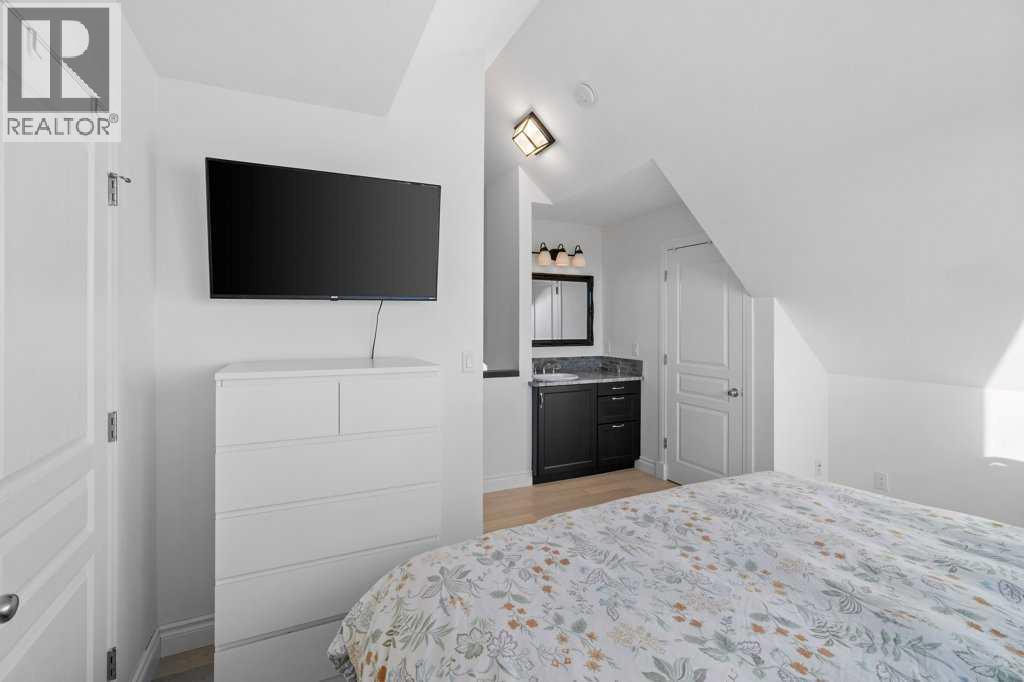 247 Cottageclub Crescent, Rural Rocky View County, Alberta  T4C 1B1 - Photo 28 - A2271474