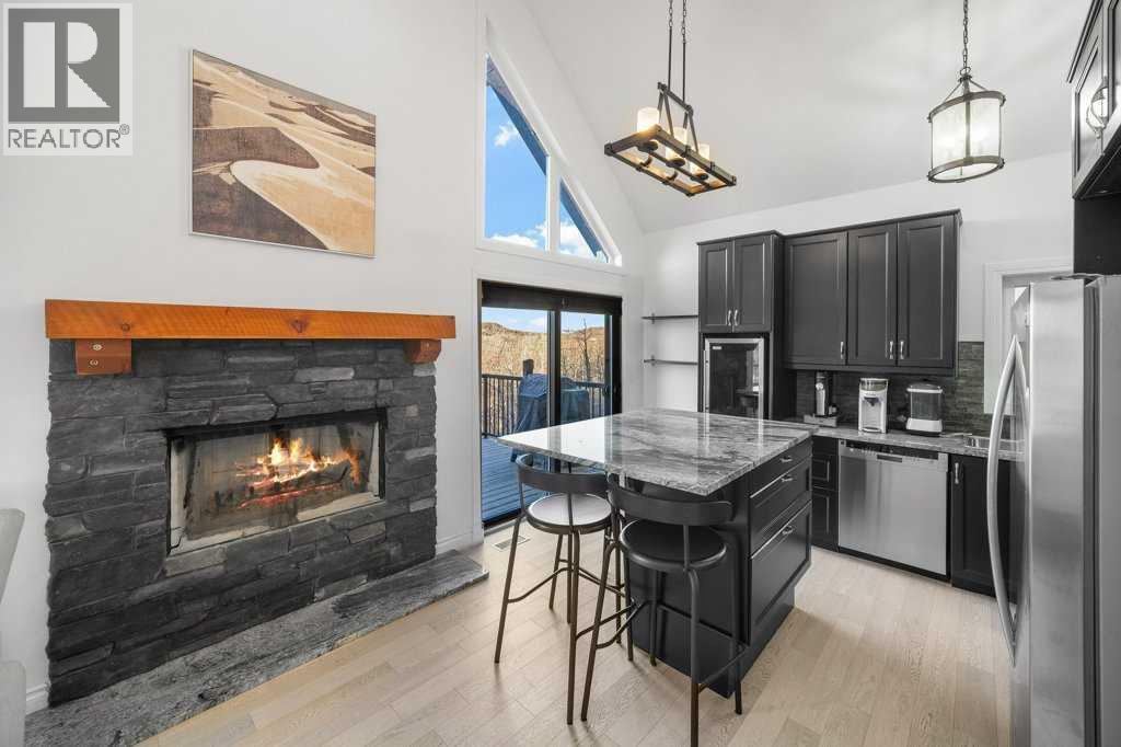 247 Cottageclub Crescent, Rural Rocky View County, Alberta  T4C 1B1 - Photo 15 - A2271474