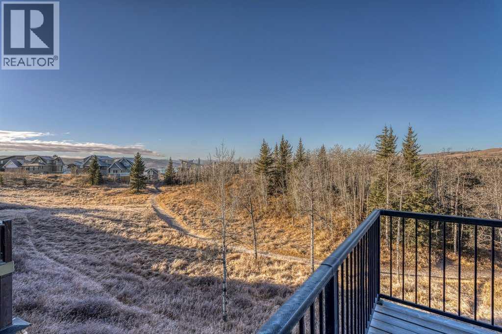 247 Cottageclub Crescent, Rural Rocky View County, Alberta  T4C 1B1 - Photo 18 - A2271474