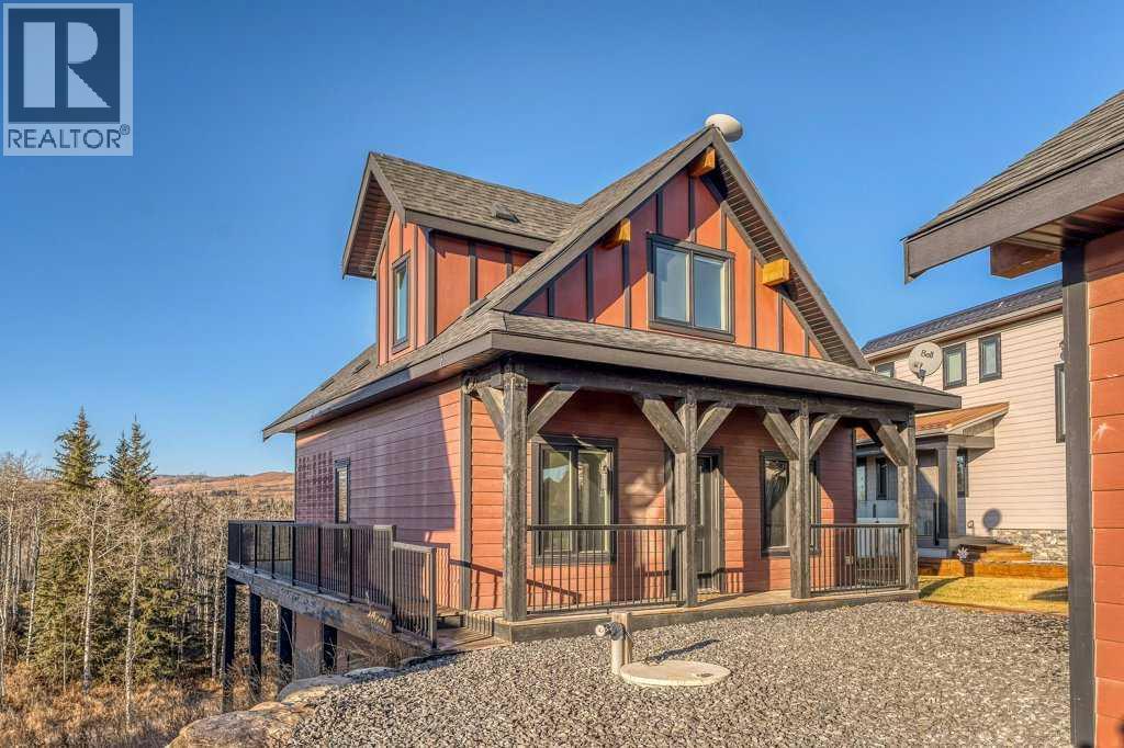 247 Cottageclub Crescent, Rural Rocky View County, Alberta  T4C 1B1 - Photo 1 - A2271474