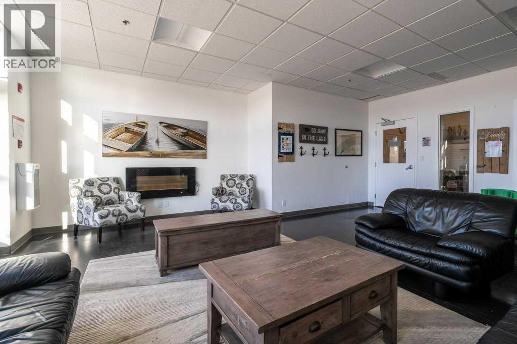 247 Cottageclub Crescent, Rural Rocky View County, Alberta  T4C 1B1 - Photo 49 - A2271474