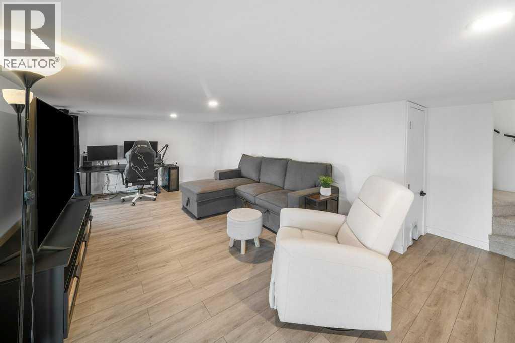 247 Cottageclub Crescent, Rural Rocky View County, Alberta  T4C 1B1 - Photo 33 - A2271474