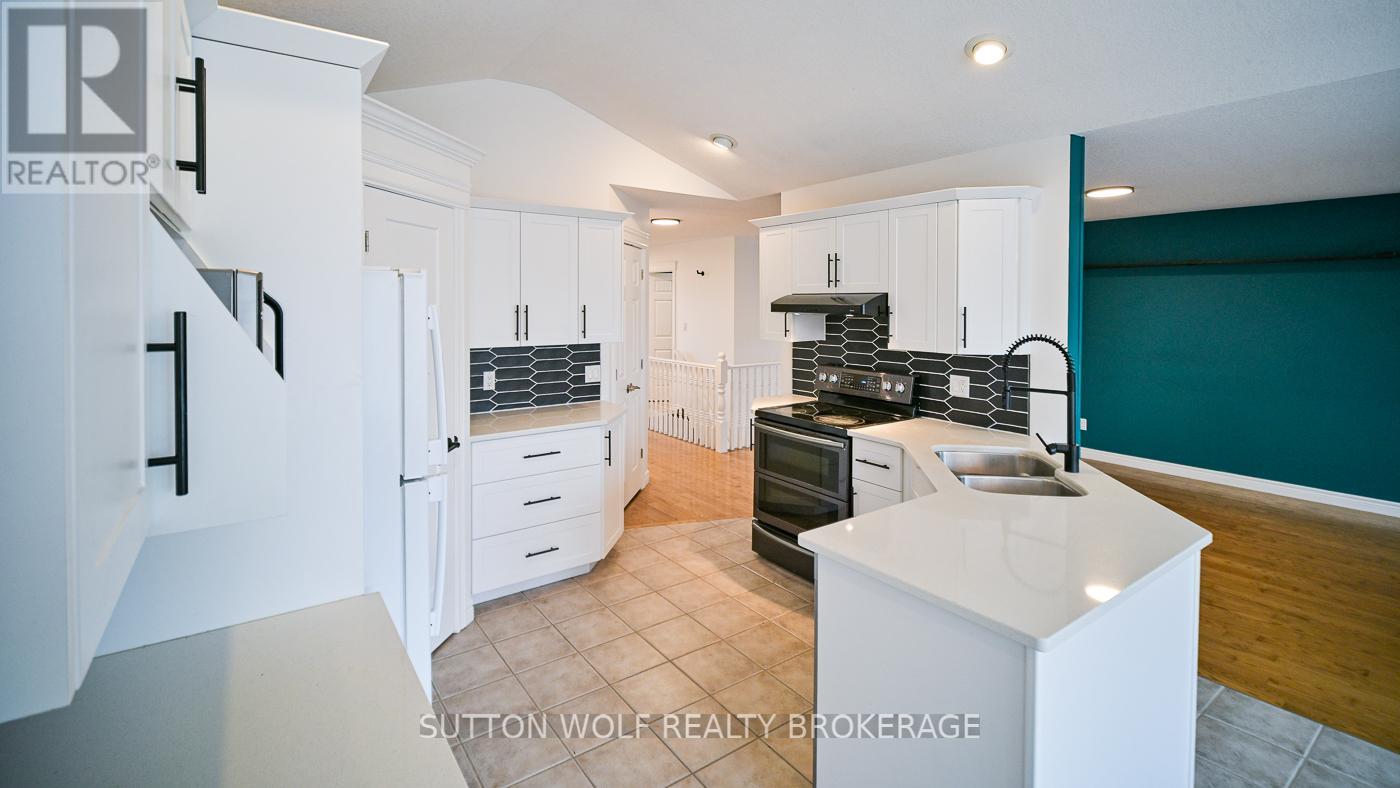 501 Darcy Drive, Strathroy-Caradoc, Ontario N7G 4K9 - Photo 8 - X12551348