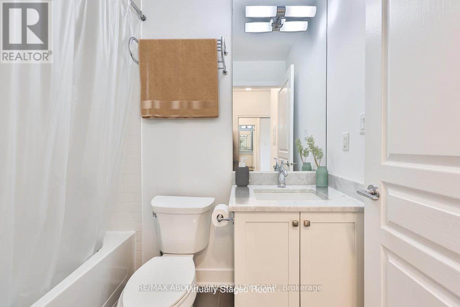 207 - 128 Garden Drive, Oakville, Ontario  L6K 2W5 - Photo 10 - W12563976