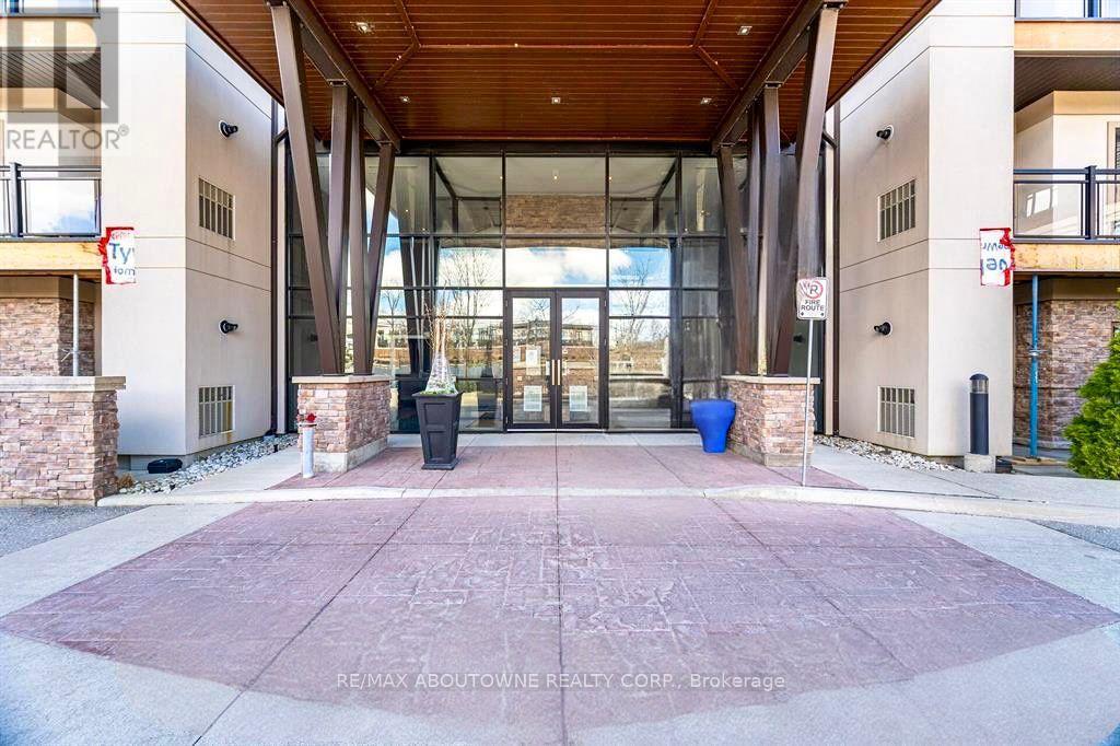 207 - 128 Garden Drive, Oakville, Ontario  L6K 2W5 - Photo 4 - W12563976