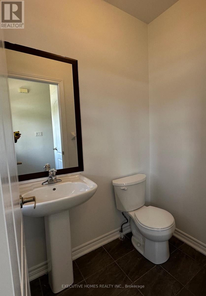 21 Elmcrest Drive, Brampton, Ontario  L6Y 0H7 - Photo 5 - W12564080