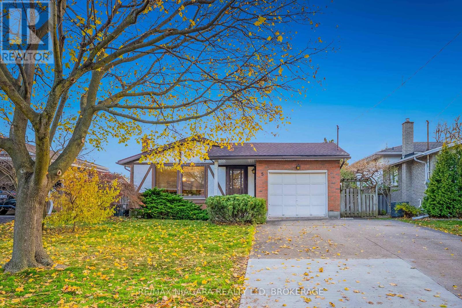 Welcome to 5 Rene Lane - a fantastic opportunity in one of St. Catharines' most convenient family-friendly neighbourhoods.This spacious 4-level backsplit offers incredible versatility, an attached garage, and a gorgeous inground pool in a private, resort-style backyard that's perfect for summer living.The main level features a bright, comfortable layout with easy flow. Upstairs, you'll find three well-sized bedrooms and a clean 4-piece bathroom-ideal for a growing family.The lower level is a standout with its separate entrance, oversized family room, and a dedicated wet bar that can easily be converted into a second kitchen for an in-law setup or kept as an entertainer's dream space for hosting family and friends. A convenient 3-piece bathroom completes this level.The basement adds even more value with a fourth bedroom, laundry area, and a spacious workshop-perfect for hobbies, storage, or future customization.This is an excellent starter home with huge upside. Add your own cosmetic touches inside and build instant equity while enjoying the flexibility this layout provides.Located close to parks, schools, bus routes, shopping, and all major amenities, this one checks all the boxes-whether you need more space, investing, or looking for the perfect multi-generational setup. Make 5 Rene Lane yours and unlock all the potential this property has to offer! (id:48254)