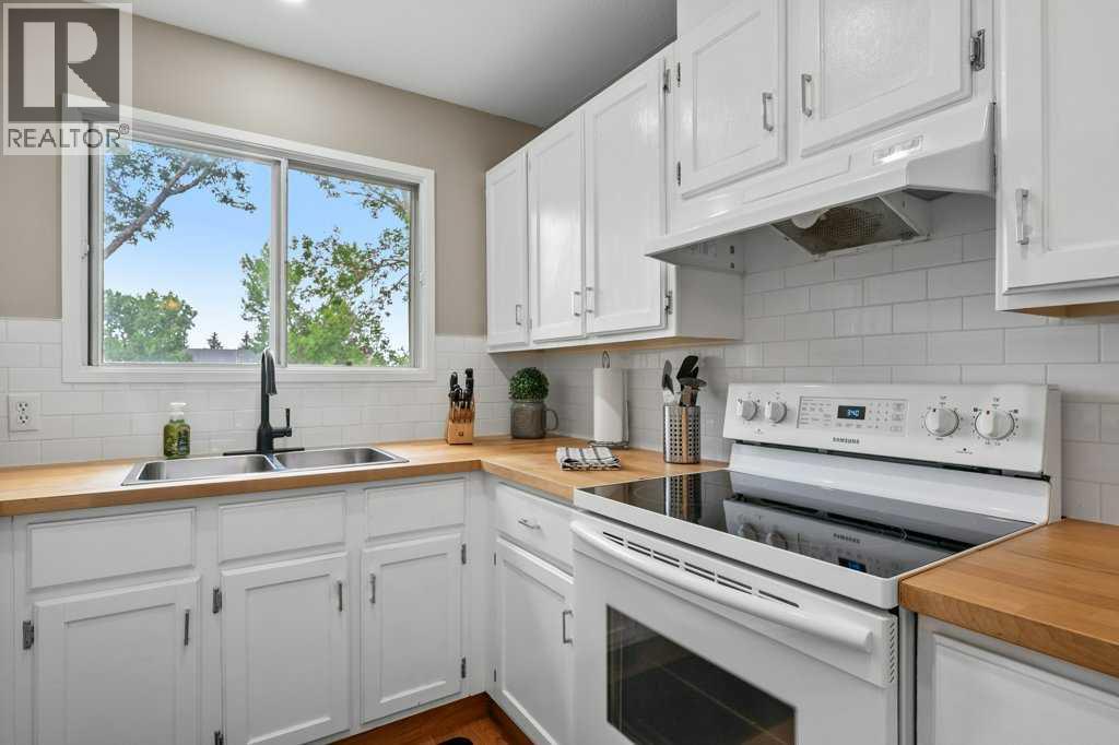 55 Macewan Drive Nw, Calgary, Alberta  T3K 2G2 - Photo 9 - A2250476