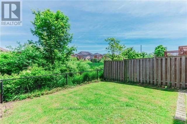 30 Lonestar Crescent, Brampton, Ontario  L7A 2H9 - Photo 9 - W12564516