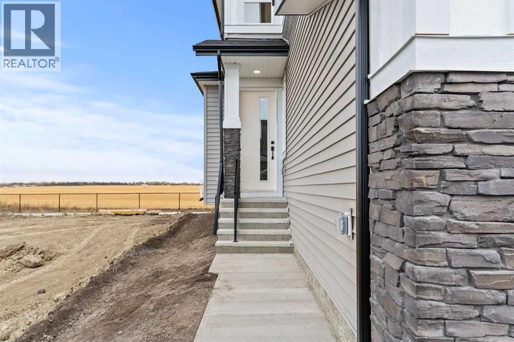 494 Kinniburgh Loop, Chestermere, Alberta  T1X 3C2 - Photo 3 - A2267199