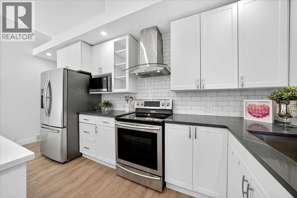 4828 Nelson Road Nw, Calgary, Alberta  T2K 2L9 - Photo 11 - A2257321