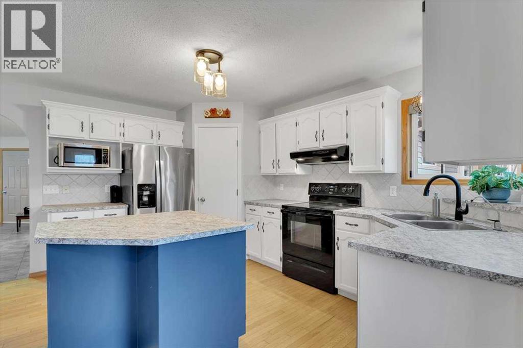 507 Sheep River Close, Okotoks, Alberta T1S 1S4 - Photo 18 - A2271137