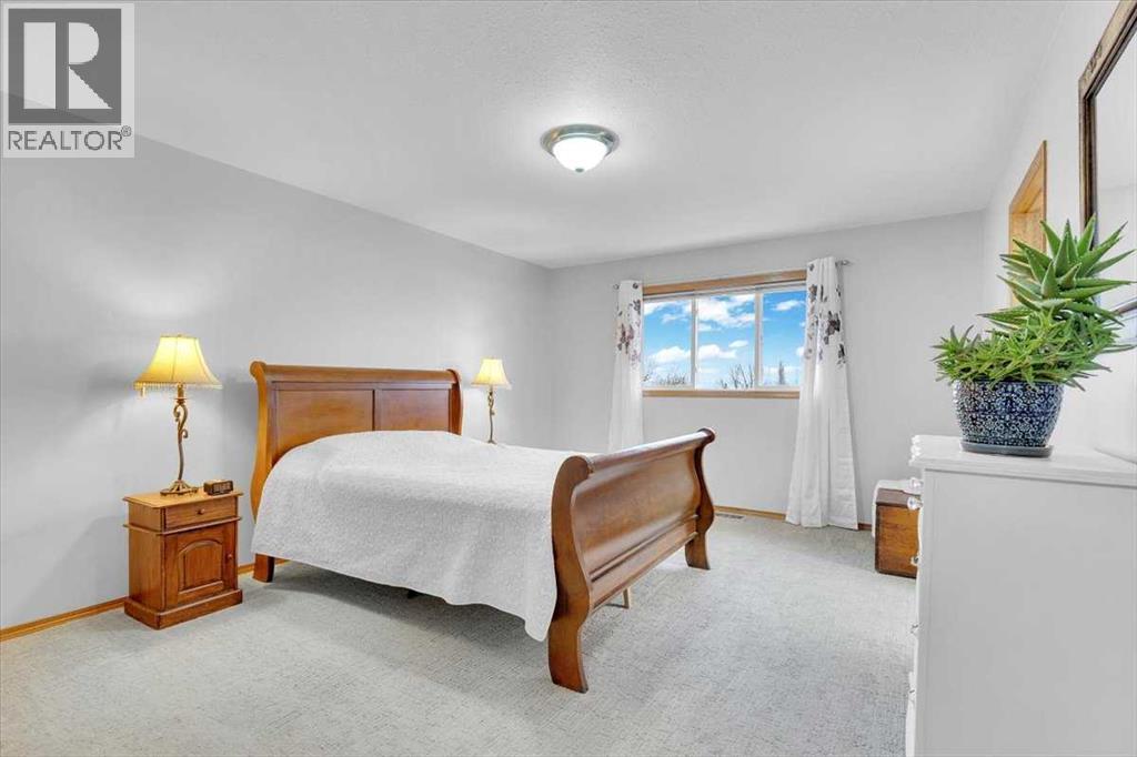 507 Sheep River Close, Okotoks, Alberta T1S 1S4 - Photo 27 - A2271137