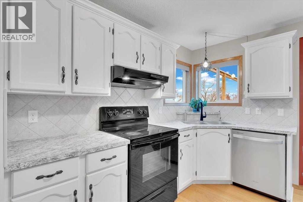 507 Sheep River Close, Okotoks, Alberta T1S 1S4 - Photo 20 - A2271137