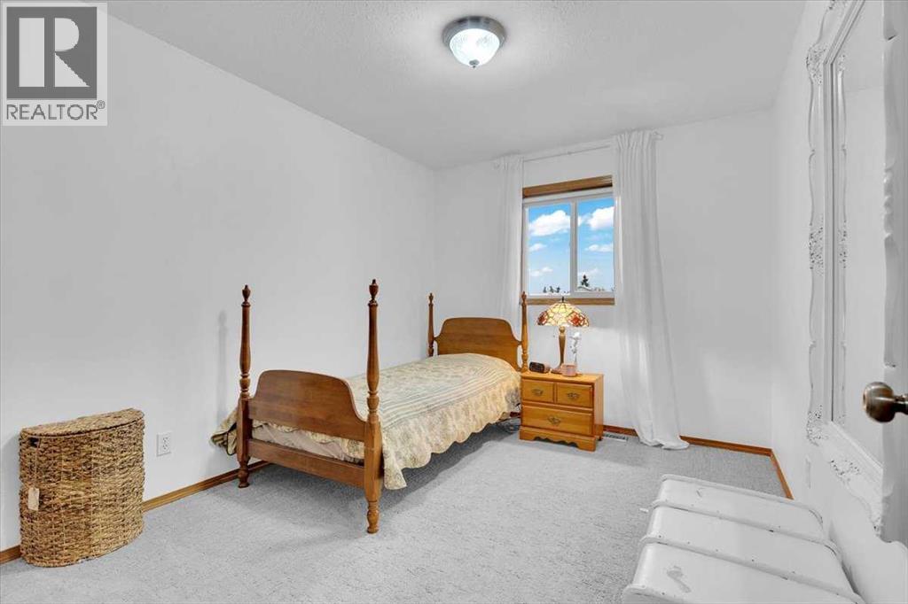 507 Sheep River Close, Okotoks, Alberta T1S 1S4 - Photo 32 - A2271137