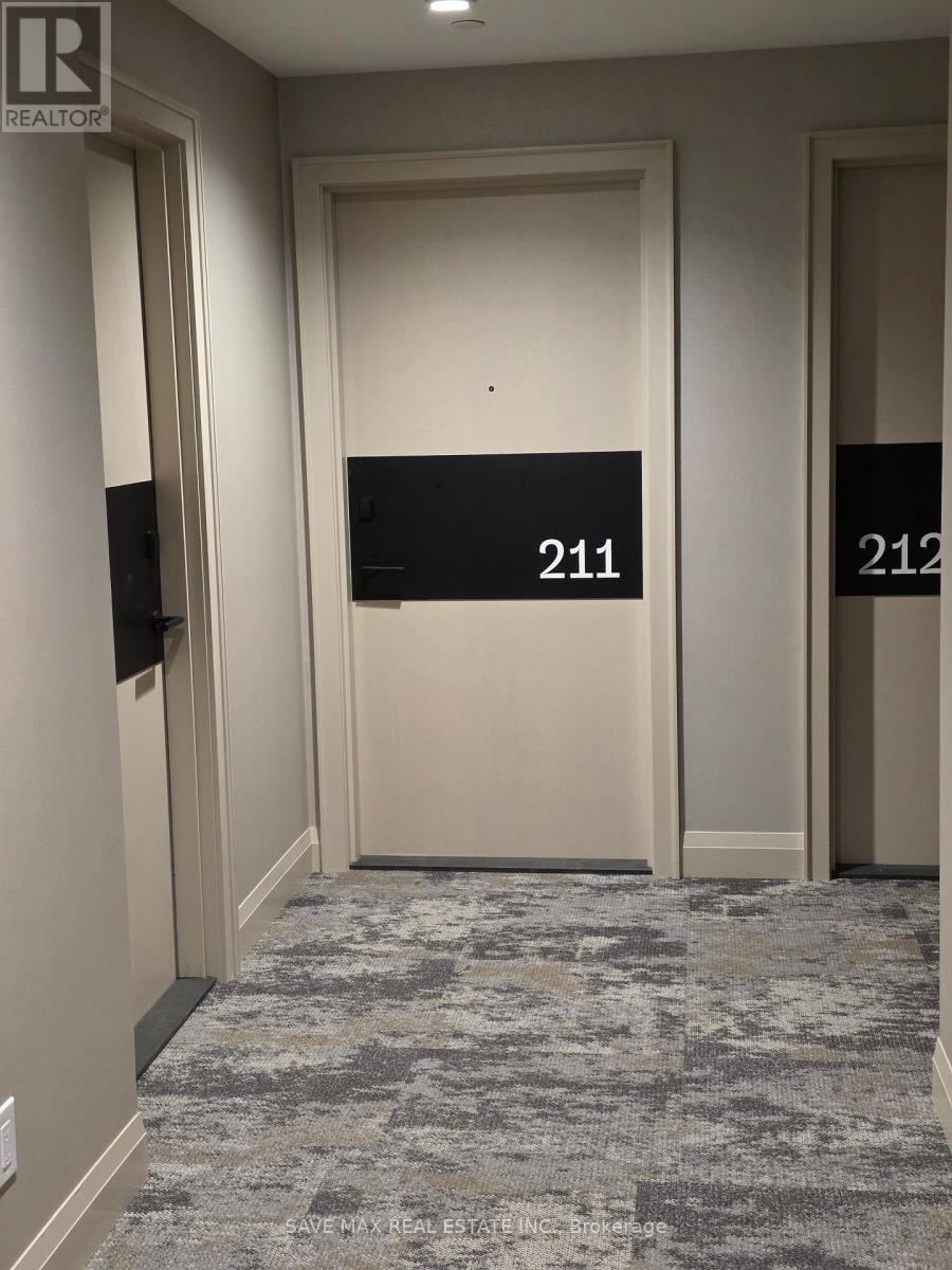 211 - 3250 Carding Mill Trail, Oakville, Ontario  L6M 1L3 - Photo 4 - W12565392